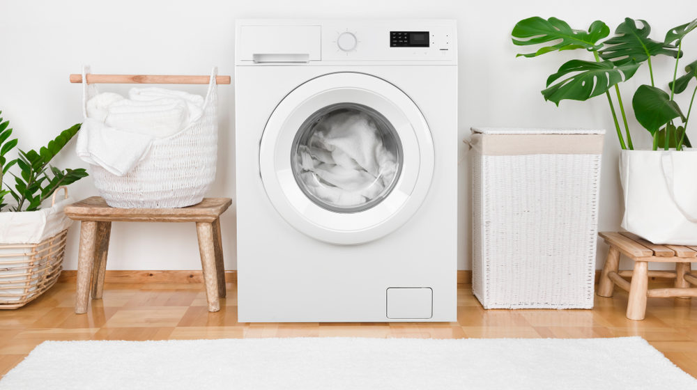 Best washing machine modern washing machine and basket with clothes e1690978124129
